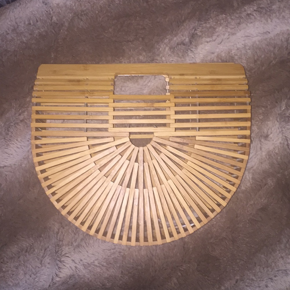 Half moon bamboo straw clutch